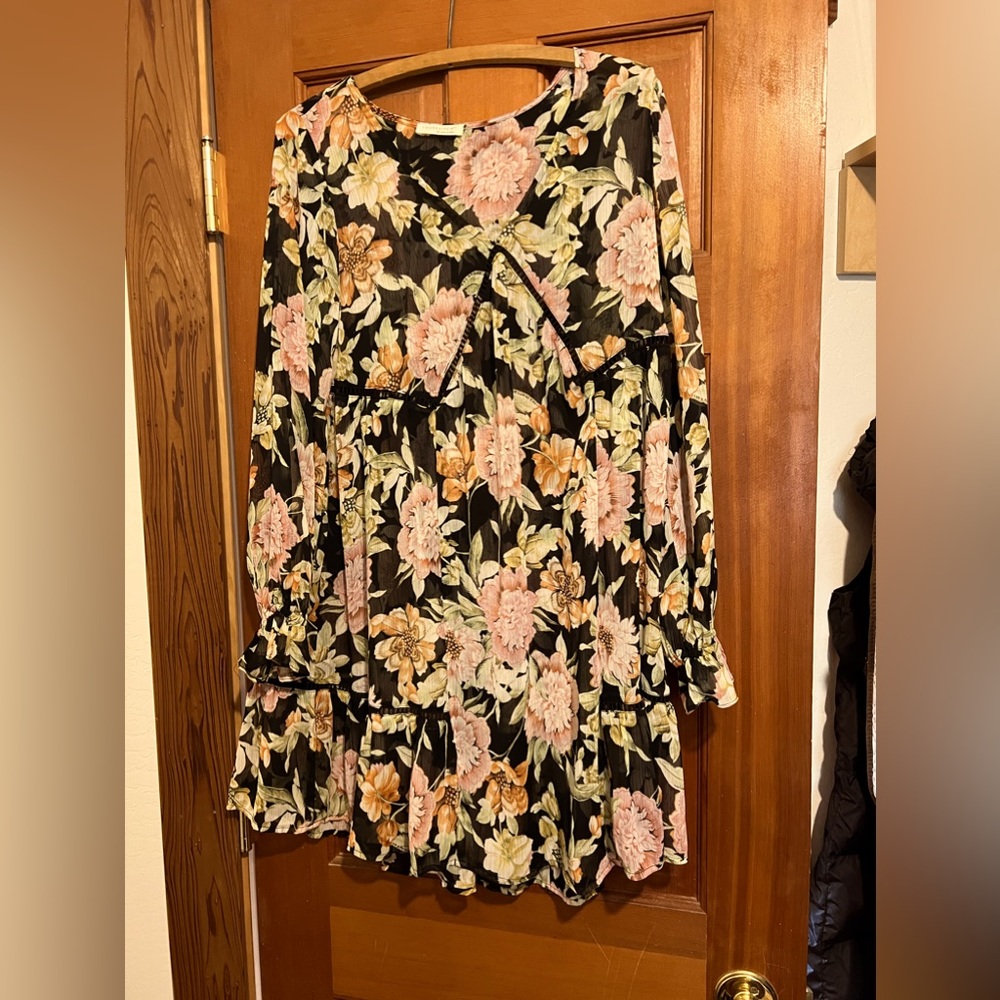 Shear, large floral dress.